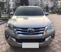 Toyota Fortuner 2018 - Bán Toyota Fortuner 2018 tự động xăng màu bạc xe như mới