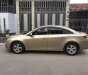 Chevrolet Cruze 2010 - Gia đình cần bán Cruze 2010, số sàn, màu vàng cát, gia đình sử dụng