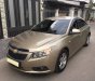 Chevrolet Cruze 2010 - Gia đình cần bán Cruze 2010, số sàn, màu vàng cát, gia đình sử dụng