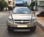 Chevrolet Captiva LT 2010 - Cần bán xe Chevrolet Captiva 2010 số sàn máy dầu, màu vàng cát