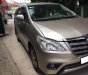 Toyota Innova 2016 - Gia đình cần bán xe Innova 2016, số sàn, máy xăng, màu vàng cát