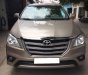 Toyota Innova 2016 - Gia đình cần bán xe Innova 2016, số sàn, máy xăng, màu vàng cát