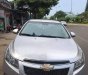 Chevrolet Cruze 2012 - Gia đình em cần bán xe Cruze đời 2012 số sàn màu bạc