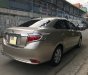 Toyota Vios 2017 - Gia đình cần bán xe Toyota Vios 2017, số tự động, màu vàng cát