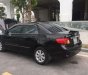 Toyota Corolla altis   2010 - Bán xe Toyota Corolla Altis đời 2010, màu đen, còn rất mới