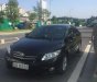 Toyota Corolla altis   2010 - Bán xe Toyota Corolla Altis đời 2010, màu đen, còn rất mới