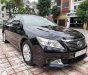 Toyota Camry 2.0E 2014 - Bán ô tô Toyota Camry 2.0E đời 2014, màu đen giá cạnh tranh