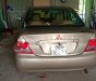 Mitsubishi Lancer 2003 - Bán Mitsubishi Lancer sản xuất năm 2003, màu vàng, nhập khẩu