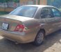 Mitsubishi Lancer 2003 - Bán Mitsubishi Lancer sản xuất năm 2003, màu vàng, nhập khẩu