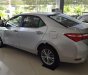 Toyota Corolla altis 1.8MT  2016 - Bán ô tô Toyota Corolla Altis 1.8MT đời 2016, màu bạc, xe như mới đi 2,1 vạn km