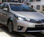 Toyota Corolla altis 1.8MT  2016 - Bán ô tô Toyota Corolla Altis 1.8MT đời 2016, màu bạc, xe như mới đi 2,1 vạn km