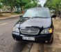 Kia Carnival 2006 - Bán ô tô Kia Carnival sản xuất năm 2006, màu đen, nhập khẩu nguyên chiếc