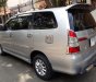 Toyota Innova E 2014 - Nhà cần bán Toyota Innova E 2014 số sàn màu bạc