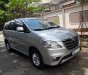 Toyota Innova E 2014 - Nhà cần bán Toyota Innova E 2014 số sàn màu bạc