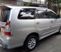 Toyota Innova E 2014 - Nhà cần bán Toyota Innova E 2014 số sàn màu bạc