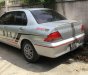 Mitsubishi Lancer  MT  2002 - Bán xe Mitsubishi Lancer MT sản xuất năm 2002, màu bạc, ít hao xăng