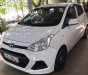 Hyundai Grand i10   2014 - Bán Hyundai Grand i10 sản xuất 2014, màu trắng, xe nhập