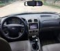 Ford Laser  1.8 2002 - Bán Ford Laser 1.8 sản xuất 2002, màu vàng, giá 145tr