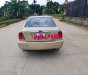 Ford Laser  1.8 2002 - Bán Ford Laser 1.8 sản xuất 2002, màu vàng, giá 145tr