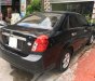 Daewoo Lacetti 2011 - Cần bán lại xe Daewoo Lacetti sản xuất năm 2011, màu đen 