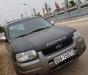 Ford Escape 2003 - Bán ô tô Ford Escape năm 2003, màu đen số sàn