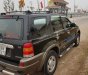 Ford Escape 2003 - Bán ô tô Ford Escape năm 2003, màu đen số sàn