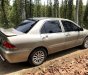 Mitsubishi Lancer   2005 - Chính chủ bán Mitsubishi Lancer đời 2005, màu vàng, nhập khẩu nguyên chiếc