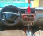 Mitsubishi Lancer 2004 - Gia đình bán xe Mitsubishi Lancer SX 2004, màu nâu, nhập khẩu