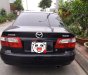 Mazda 626    1999 - Chính chủ bán xe Mazda 626 đời 1999, màu đen giá cạnh tranh