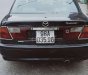 Mazda 323   2000 - Bán Mazda 323 đời 2000, màu đen