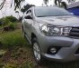 Toyota Hilux 2.4E 4x2 MT 2017 - Bán ô tô Toyota Hilux 2.4E 4x2 MT 2017, màu bạc, xe nhập còn mới