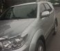 Toyota Fortuner 2011 - Gia đình bán Toyota Fortuner đời 2011, màu bạc 