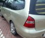 Nissan Grand livina   2011 - Bán Nissan Grand livina đời 2011, màu vàng, số sàn  