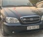 Kia Carnival   2009 - Cần bán Kia Carnival sản xuất năm 2009, màu đen, số tự động