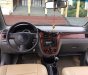 Chevrolet Lacetti 1.6 2013 - Cần bán Chevrolet Lacetti 1.6 đời 2013, màu đen, chính chủ