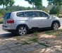 Chevrolet Orlando 2012 - Cần bán gấp Chevrolet Orlando sản xuất 2012, màu bạc