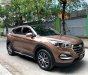 Hyundai Tucson 2.0AT 2016 - Bán Hyundai Tucson 2.0AT đời 2016, màu nâu, nhập khẩu 