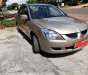 Mitsubishi Lancer 2004 - Bán Mitsubishi Lancer đời 2004, màu vàng, xe nhập xe gia đình