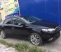 Kia Forte SX 1.6 AT 2010 - Cần bán lại xe Kia Forte SX 1.6 AT đời 2010, màu đen, giá tốt