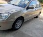 Mitsubishi Lancer 2004 - Bán Mitsubishi Lancer đời 2004, màu vàng, xe nhập xe gia đình