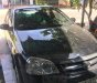 Daewoo Lacetti   2005 - Bán Daewoo Lacetti đời 2005, màu đen, số sàn