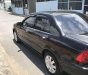 Ford Laser   2002 - Bán Ford Laser năm 2002, màu đen, xe nhập