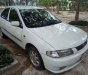 Mazda 323 1.6 2000 - Gia đình bán Mazda 323 1.6 đời 2000, màu trắng, xe nhập