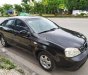 Daewoo Lacetti EX 2005 - Nhà bán Daewoo Lacetti EX đời 2005, màu đen số sàn