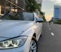 BMW 3 Series   2014 - Bán BMW 320i đời 2014, màu trắng, nhập khẩu  