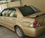 Mitsubishi Lancer 2004 - Cần bán lại xe Mitsubishi Lancer đời 2004, màu vàng xe gia đình, giá chỉ 230 triệu