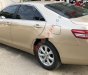 Toyota Camry 2010 - Cần bán gấp Toyota Camry sản xuất 2010, màu vàng