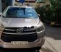 Toyota Innova E 2017 - Bán Toyota Innova E đời 2017, màu đồng ánh kim