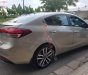 Kia Cerato 2016 - Cần bán lại xe Kia Cerato sản xuất năm 2016, màu vàng chính chủ