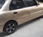 Daewoo Lanos   2001 - Cần bán Daewoo Lanos sản xuất năm 2001, màu vàng